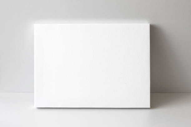 istock Blank canvas. Gray wall and floor on background. 1083318312