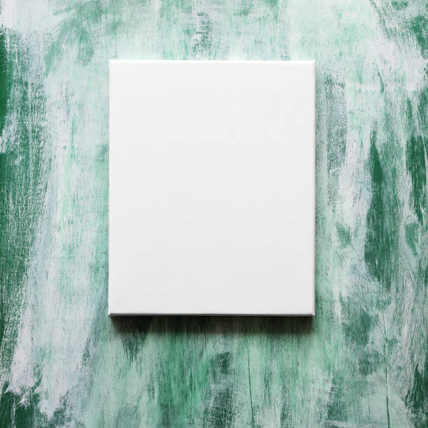 istock Blank canvas on vintage green board. 1083319512