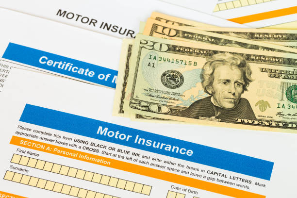 istock Motor or car insurance application with banknote 1083321014