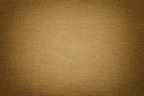 istock Dark brown background from a textile material. Fabric with natural texture. Backdrop. 1083323846