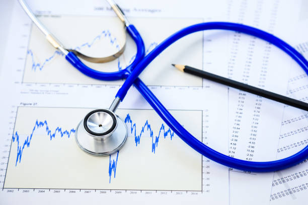 istock Stethoscope and finance document for financial health check concept 1083326128