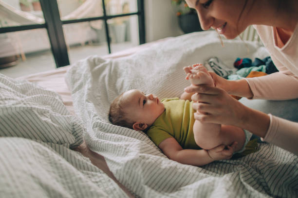 istock Baby boy and his mom 1083331212