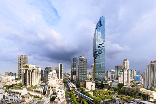 istock Bangkok business district cityscape with skyscraper at evening, Thailand 1083332046