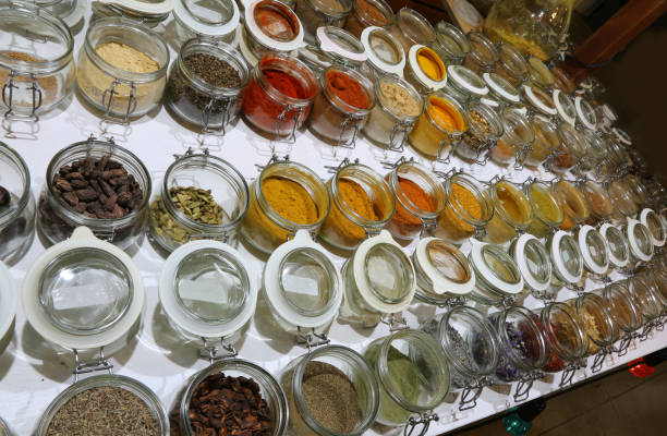 istock many jars with spices and dried aromatic herbs gathered all over 1083333516