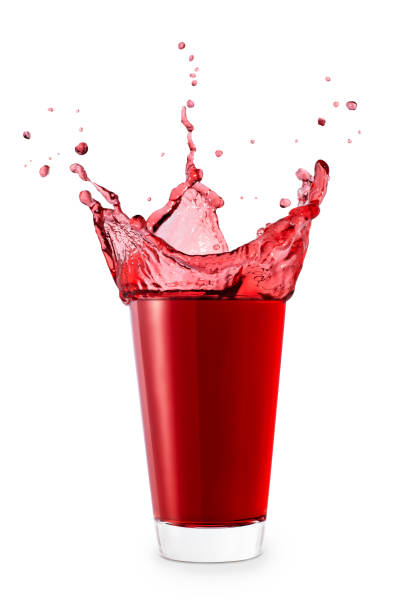 Beautiful splash, splashes of wine or juice in glass, isolate on a white background