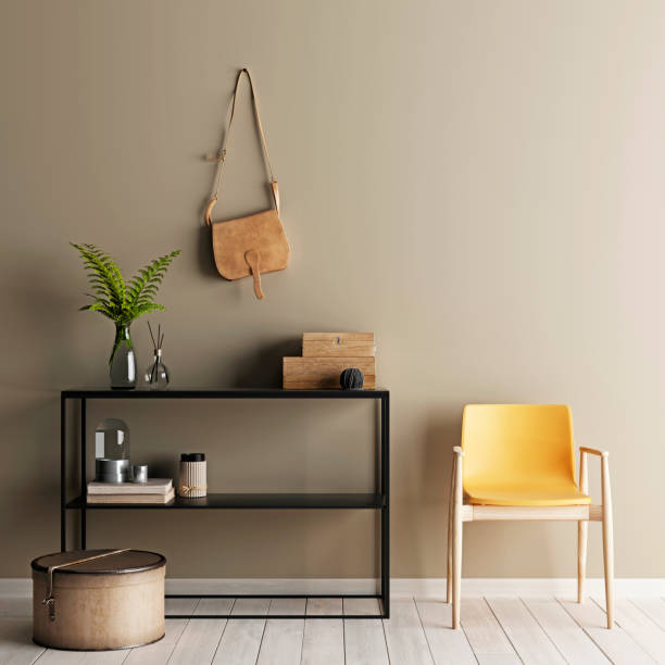 istock Interior with beige wall yllow chair and low table with deckor. 1083343768