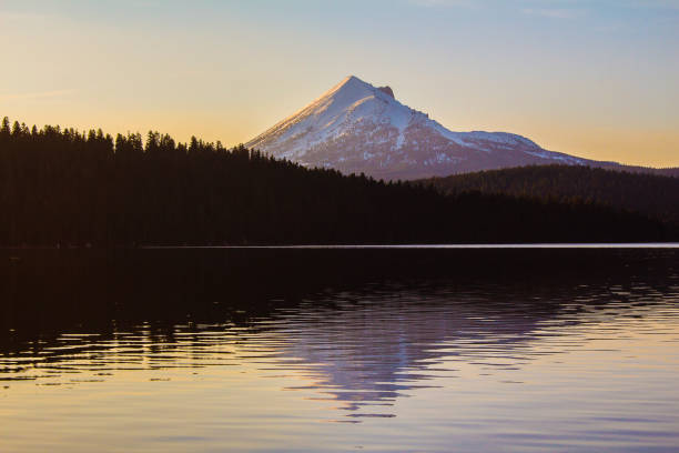 Lake of the Woods & Mt. McLaughlin Sunset A surreal view of snowcapped Mt. McLaughlin as seen from Lake of the Woods, Oregon. mt mclaughlin photos stock pictures, royalty-free photos & images