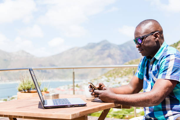 istock African guy texting on his smartphone 1083346890