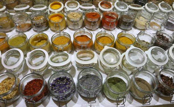 istock jars with spices and dried aromatic herbs gathered all over the 1083348946