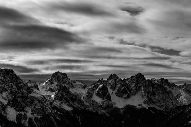 istock Mangart capped by the fog 1083350036