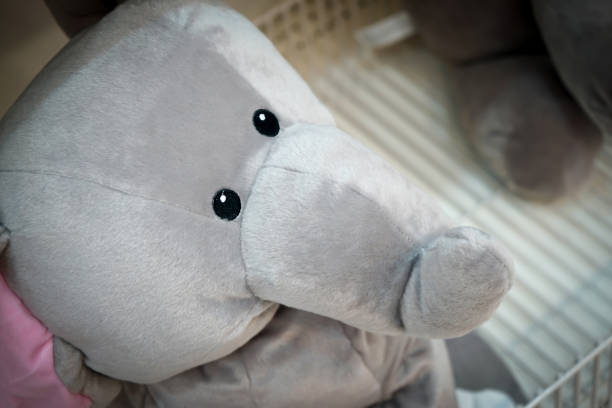 Elephant dolls for sales lay down on the sheft.