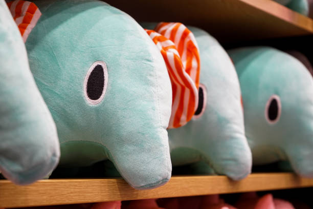 istock Elephant dolls for sales lay down on the sheft. 1083354160