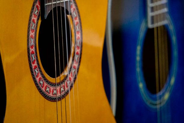 istock old acoustic guitar detail 1083356592