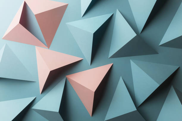 istock Close-up of triangular shapes of paper, abstract background 1083356612