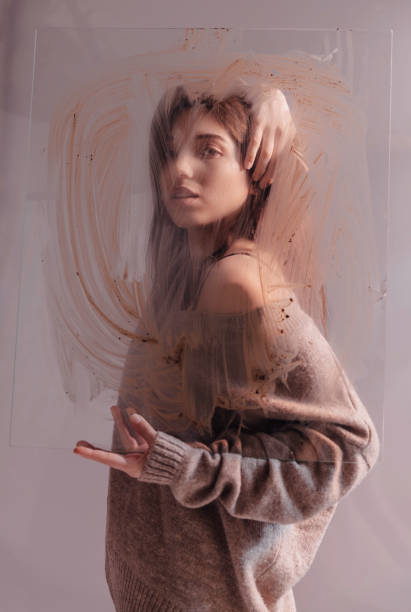 istock Dirty glass with woman 1083360258