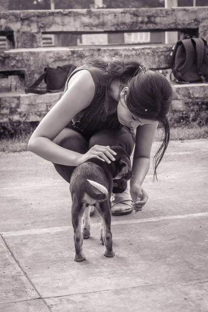 A young woman with her dog