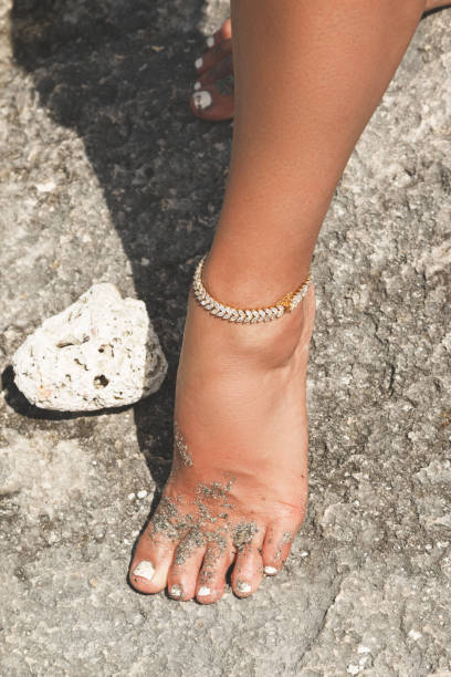 Beautiful female foot and elegant anklet