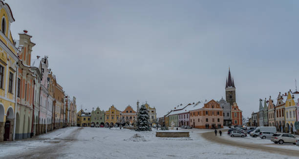 istock Square in old Telc town in winter dark cold morning 1083386206