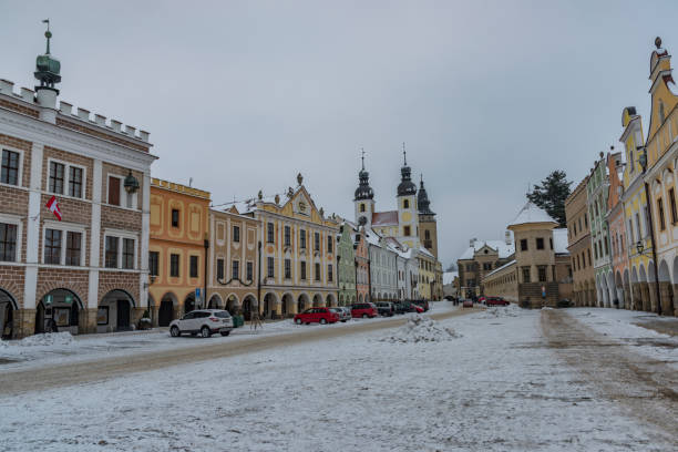 istock Square in old Telc town in winter dark cold morning 1083386234
