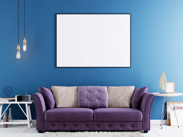istock Mock up poster on a blue wall in modern hipster interior with violet sofa and white table. 1083388816