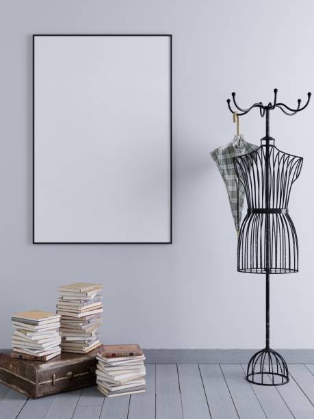 istock Mock up poster frame in interior with decorative hanger and an old suitcase with books. 1083391176