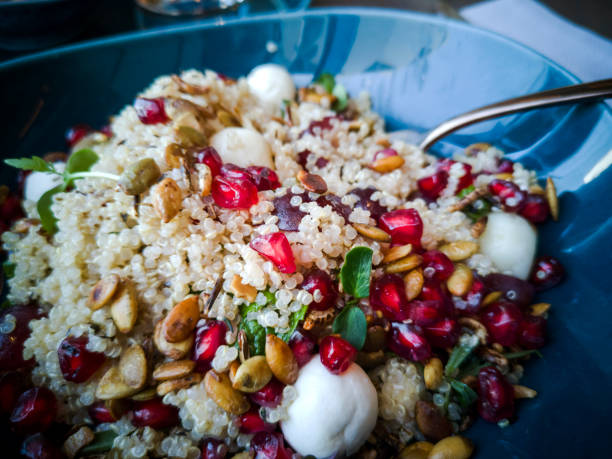 istock quinoa salad bowl with pomegranate seeds 1083392772