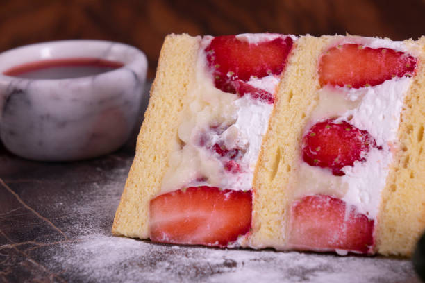 istock Strawberry cake in marble plate on wooden table 1083393492