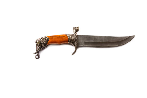 istock Curved ceremonial dagger knife with a decorative sheath isolated on a white background. Vintage dagger on a white background. Dagger mockup on white. 1083400682