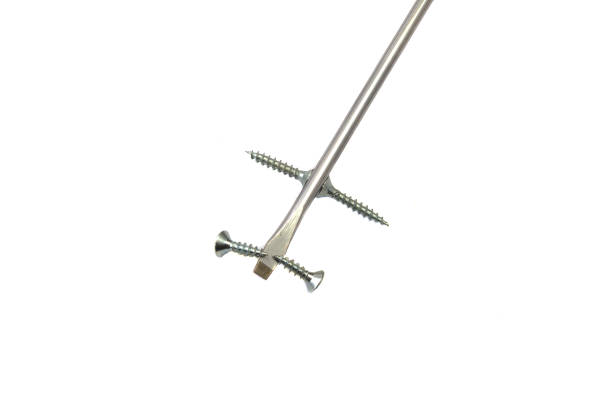 istock Nails and screws on a white background. 1083402484