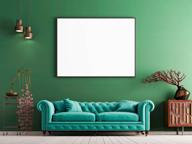 istock mock up poster on green wall in interior classical style with light mint sofa, and decor. 1083402684