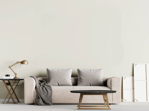 istock Livingroom interior wall mock up with fabric sofa and pillows on olive background. 1083402824