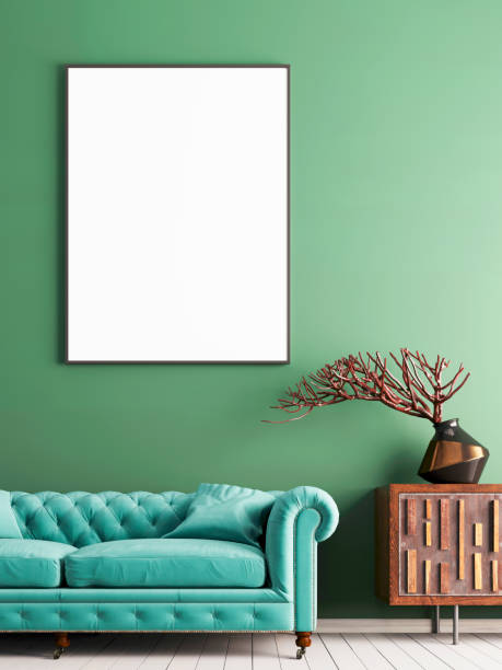 istock mock up poster on green wall in interior classical style with light mint sofa, and decor. 1083404122