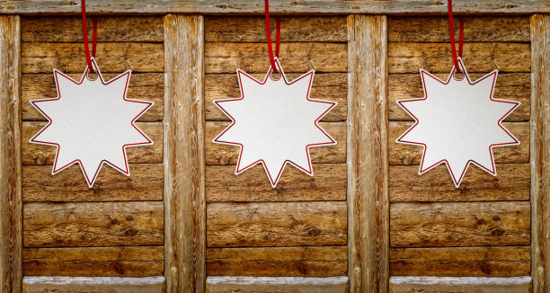 Three star price sticker over wooden frame background with copy space