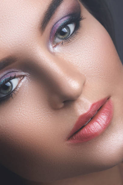 istock Female face with beautiful eye shadows 1083414868