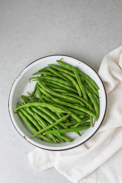 Fresh Green Beans on a Light Gray Background