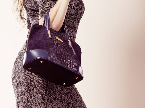 istock Chic woman with handbag. 1083431512