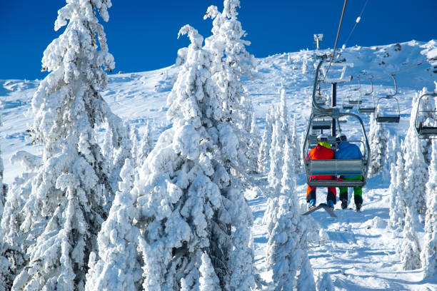 Ski lift view Resort skiing in powder snow. ski lift photos stock pictures, royalty-free photos & images