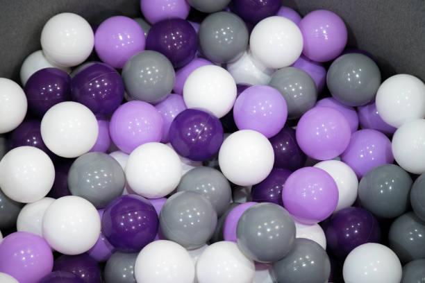 istock Many ping pong or lottery balls close-up background. 1083436802