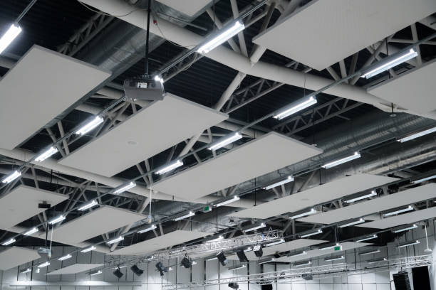 istock Factory building or warehouse building. Vast empty space with ventilation pipes and lights 1083436824