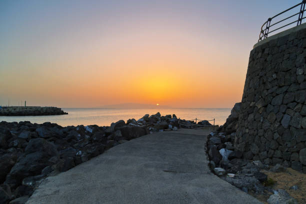 istock sea sunset at stones beach 1083436876