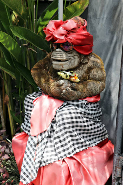 istock tirtagangga water palace - stone monkey - Bali 1083440948