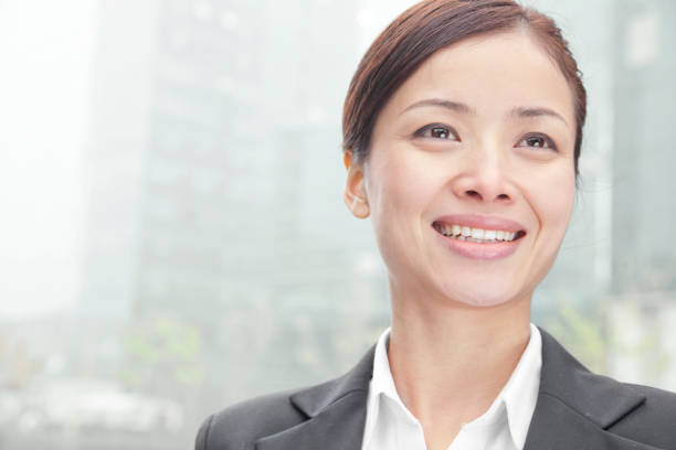 istock Chinese businesswoman smiling 1083443184