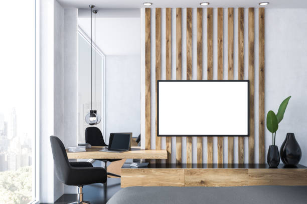 White and wooden home office, tv Interior of small home office with white and wooden walls, black floor, wooden computer table and armchair and mock up tv set screen on the wall. 3d rendering wall of monitors stock pictures, royalty-free photos & images