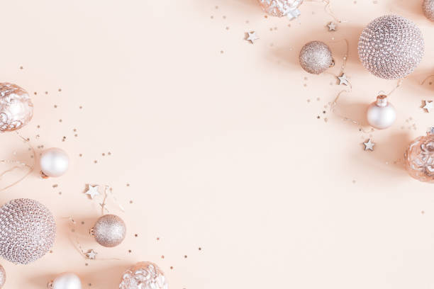 Christmas composition. Christmas decorations on pastel beige background. Flat lay, top view, copy space