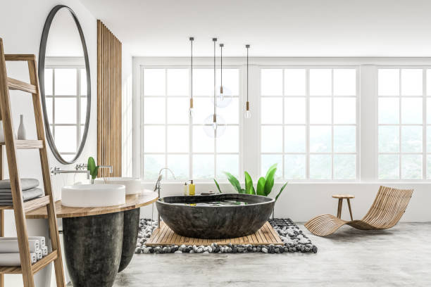 istock White loft bathroom, black tub 1083456842