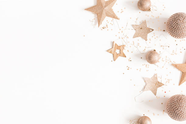 istock Christmas composition. Christmas golden decorations on white background. Flat lay, top view, copy space 1083456940
