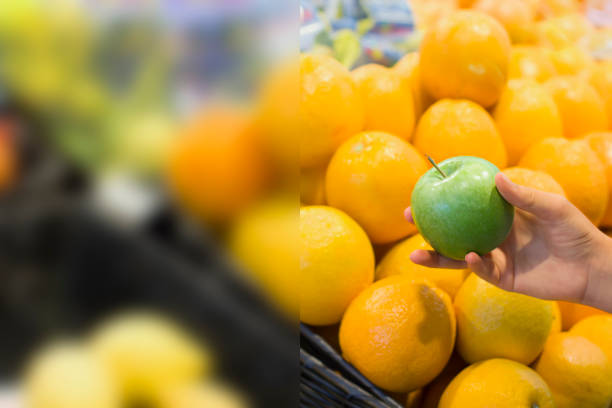 istock Female hand choosing vegetables in the store 1083459018