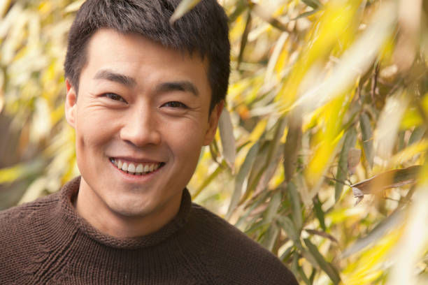 Chinese man standing outdoors