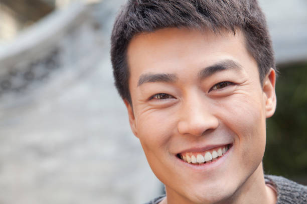 istock Chinese man smiling close up 1083464922
