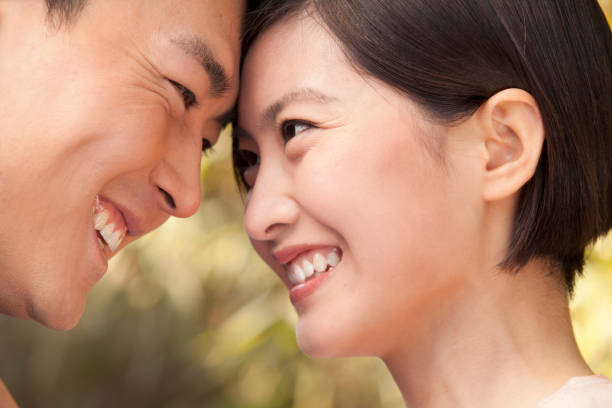 istock Chinese couple standing face to face 1083464950